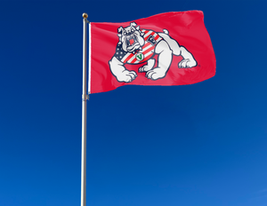 Red Fresno State University Flag with Bulldog Wearing American Flag Shirt and two metal grommets attached to flagpole waving in the wind