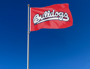 red Fresno State University 3x5 Flag with Bulldogs Logo and two metal grommets attached to flagpole waving in the wind