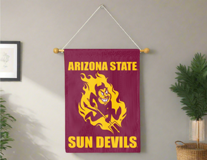 Maroon 30x40 inch long Arizona State University Sun Devils House Flag hanging on banner pole in the middle of a living room wall 