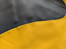 Load image into Gallery viewer, Close-up of an iowa hawkeye logo hand-sewn on an applique flag
