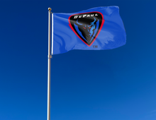 Load image into Gallery viewer, Blue 3x5 foot wide DePaul University Flag with DePaul Demon Head logo and two metal grommets attached to flagpole waving in the wind
