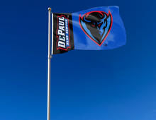 Load image into Gallery viewer, 3x5 foot wide black stripe blue stripe DePaul University flag with DePaul Blue Demons Logo Blue Demon head logo and two metal grommets attached to flagpole waving in the wind
