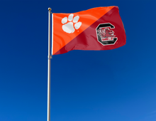 Load image into Gallery viewer, orange and red Clemson South Carolina Game Flag attached to flagpole waving in the wind
