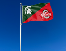 Load image into Gallery viewer, green and red MSU Ohio State House Divided Flag attached to flagpole waving in the wind
