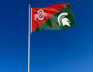 red and green Ohio State MSU house divided flag attached to flagpole waving in the wind