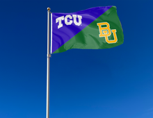 Load image into Gallery viewer, purple and green TCU Baylor House Divided flag with two metal grommets attached to flagpole waving in the wind
