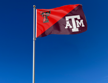 Load image into Gallery viewer, red and maroon Texas Tech Texas A&amp;M House Divided Flag attached to flagpole waving in the wind

