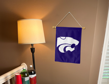 Load image into Gallery viewer, kansas state university garden flag hanging on banner pole inside living room
