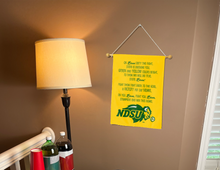 Load image into Gallery viewer, NDSU Fight Song garden flag hung inside a college dorm for dorm decor
