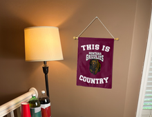 Load image into Gallery viewer, This is Montana Grizzlies Country garden flag hung inside college dorm

