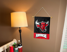 Load image into Gallery viewer, indoor display of uno mavericks garden flag as part of man cave decor
