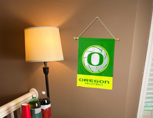 Load image into Gallery viewer, Oregon Volleyball Garden Flag hung inside of well-lit college dorm
