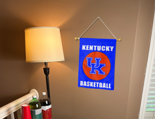 Load image into Gallery viewer, Kentucky basketball garden flag hung inside a college dorm for man cave decor
