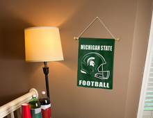 Load image into Gallery viewer, michigan state university football garden flag hung inside of college dorm
