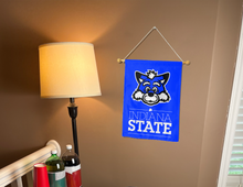Load image into Gallery viewer, indiana state garden flag with sycamore sam logo hung inside a college dorm
