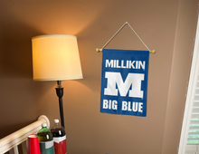 Load image into Gallery viewer, Millikin university garden flag with big blue logo hung inside for college dorm decor
