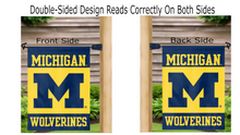 Load image into Gallery viewer, blue and gold Michigan wolverines garden flag hung from mailbox flagpole displayed from both sides
