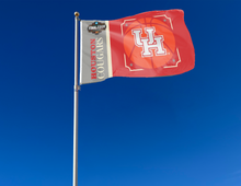 Load image into Gallery viewer, Houston Basketball Men&#39;s Final Four 3x5 Flag with two metal grommets attached to flagpole waving in the wind
