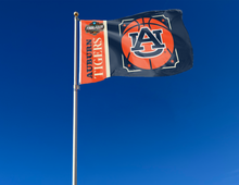 Load image into Gallery viewer, blue and orange Auburn Basketball Men&#39;s Final Four 3x5 Flag for indoor home décor with two metal grommets attached to flagpole waving in the wind
