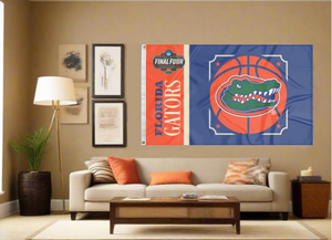 Orange and blue Florida Basketball Men's Final Four Flag with two metal grommets covering tan wall of a well lit room