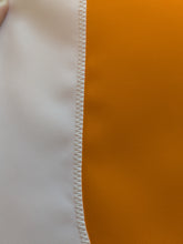 Load image into Gallery viewer, close-up of white Tennessee T logo sewn on orange University of Tennessee applique flag
