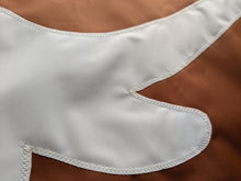 Load image into Gallery viewer, close up of white stitched texas longhorns logo on an orange university of texas longhorns applique flag
