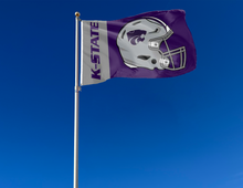 Load image into Gallery viewer, 3x5 foot wide Kansas State University Football Flag with two metal grommets attached to flagpole waving in the wind
