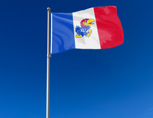 Load image into Gallery viewer, university of Kansas Flag with french style flag colors hung outside for yard decor
