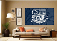 Load image into Gallery viewer, Blue 3x5 foot wide Penn State Big Ten Conference Champion 2024 Flag with Two metal grommets covering a tan wall of well organized room with couch and pillows
