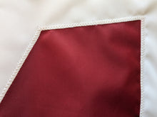 Load image into Gallery viewer, Close-up of the Alabama University A logo hand-sewn onto an applique flag with white zig zag technique
