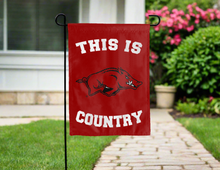 Load image into Gallery viewer, This is Arkansas Razorbacks country garden flag hung for yard decor
