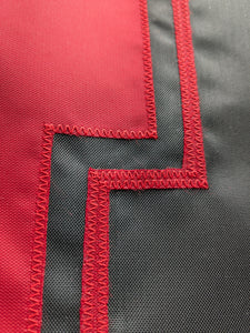 Red N logo sewn onto black three by five foot University of Nebraska Applique flag with two metal grommets