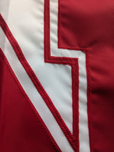Load image into Gallery viewer, Red N logo sewn onto White three by five foot wide University of Nebraska Lincoln Applique flag with two metal grommets 
