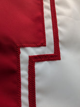 Load image into Gallery viewer, Red N logo sewn onto White three by five foot wide University of Nebraska Lincoln Applique flag with two metal grommets 

