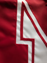 Load image into Gallery viewer, Red N logo sewn onto White three by five foot wide University of Nebraska Lincoln Applique flag with two metal grommets 

