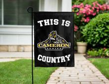 Load image into Gallery viewer, black double sided garden flag with this is cameron aggies country logo for yard decor
