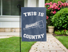 Load image into Gallery viewer, blue double sided garden flag with this is brandeis athletics country logo for yard decor
