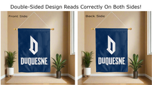 Load image into Gallery viewer, duquesne university logo reading correctly on both sides of blue double sided house flag
