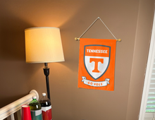 Load image into Gallery viewer, indoor display of Tennessee garden flag with go vols logo for dorm decor
