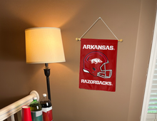 Load image into Gallery viewer, arkansas football garden flag hung inside a college dorm for dorm decor
