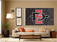 Load image into Gallery viewer, indoor display of black san diego state university aztecs flag for man cave decor
