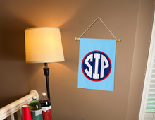Load image into Gallery viewer, ole miss sip garden flag hung inside a college dorm for man cave decor
