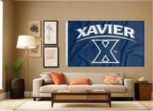 Load image into Gallery viewer, indoor display of blue xavier university flag for man cave decor
