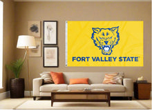 Load image into Gallery viewer, indoor display of gold fort valley state university wildcats flag for man cave decor
