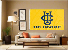 Load image into Gallery viewer, indoor display of gold uc irvine flag for man cave decor
