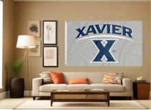 Load image into Gallery viewer, indoor display of grey xavier university flag for man cave decor
