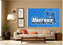 Load image into Gallery viewer, indoor display of blue harford community college fighting owls flag for man cave decor
