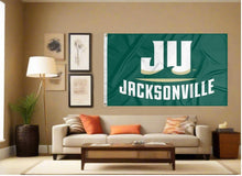 Load image into Gallery viewer, indoor display of green jacksonville university dolphins flag for man cave decor
