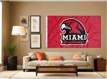 Load image into Gallery viewer, indoor display of red miami university flag for man cave decor
