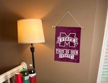 Load image into Gallery viewer, mississippi state garden flag with this is our state logo hung inside for college dorm decor
